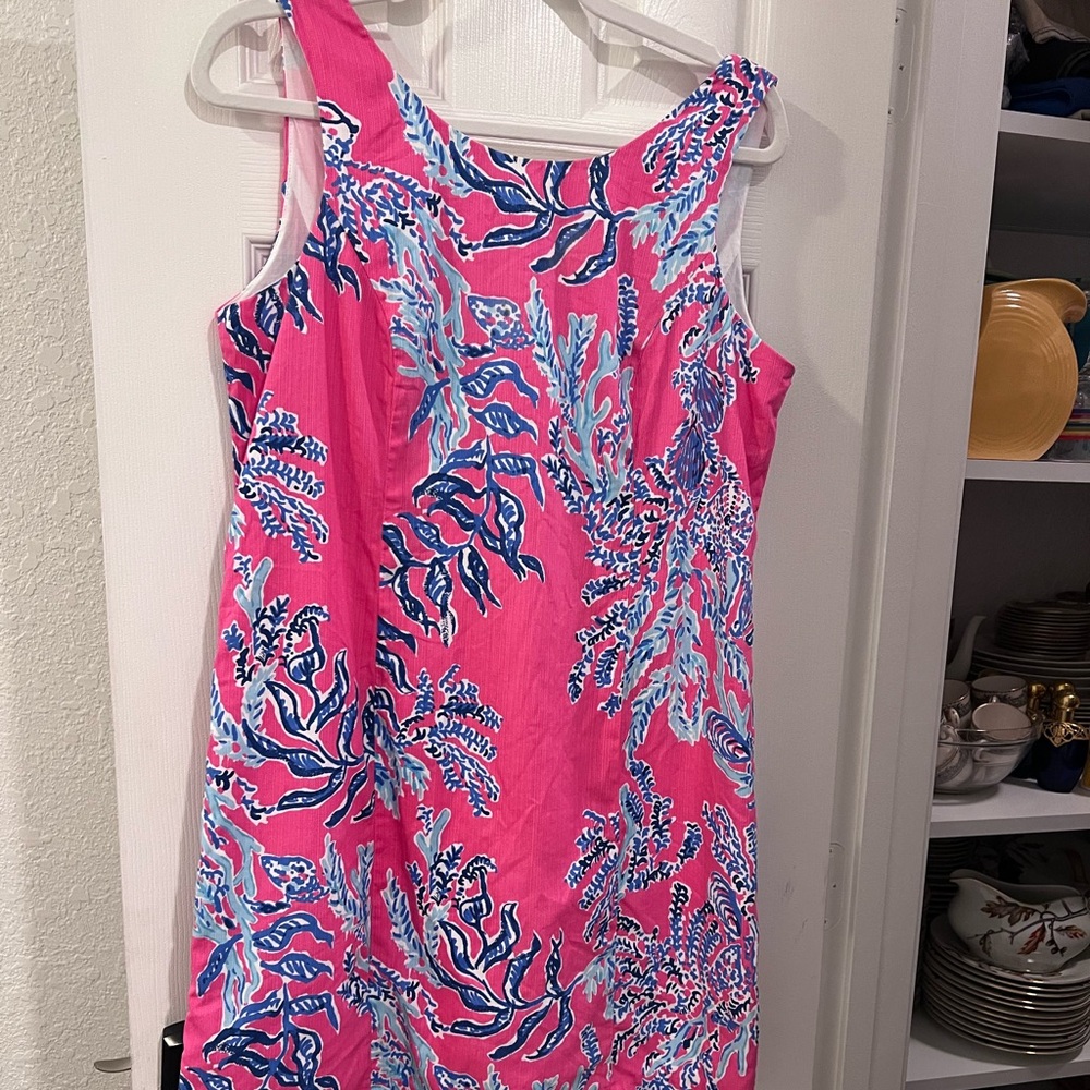 Vibrant Pink Sleeveless Dress with Blue Floral Design